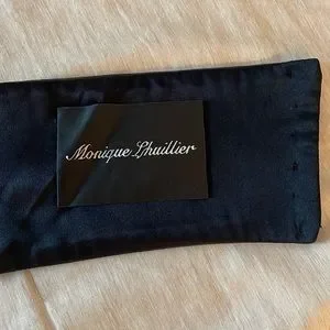 Monique Lhuillier Curved Black Belt Designer Monique Lhuillier Headed to London With New Outpost main image 4